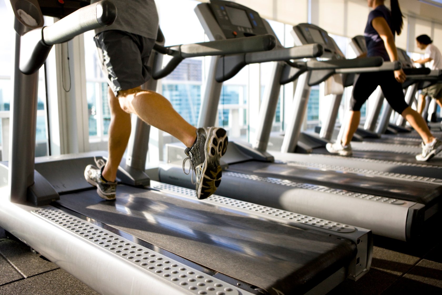 Running on treadmill in gym